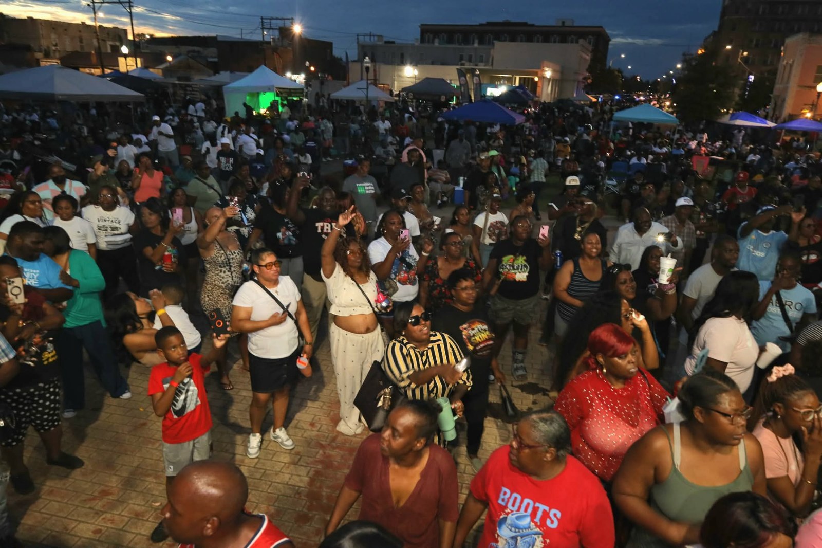 Neighbors gathered at an evening community event